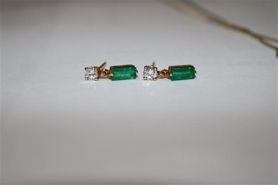 A gold, emerald and diamond pendant on a 14ct gold chain and a pair of similar gold, emerald and diamond ear studs.